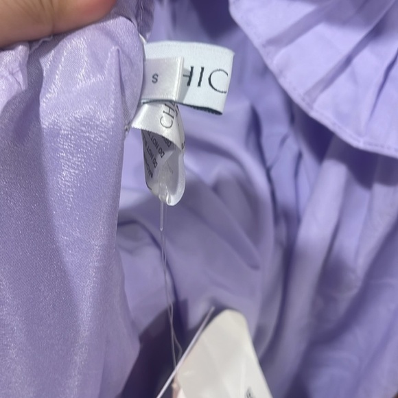 PLEATED RUFFLE BUTTONED DEEP V-NECK DRESS IN LILAC - Picture 13 of 14